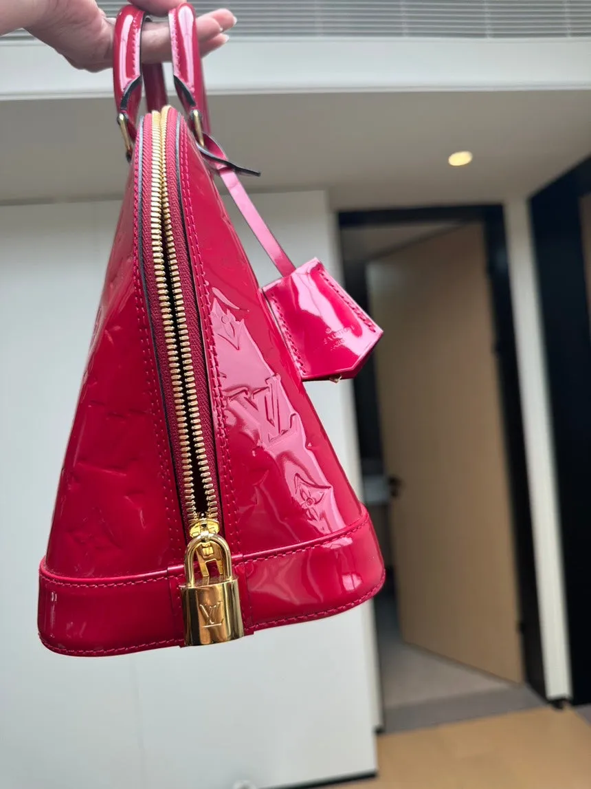 LOUIS VUITTON Alma Top Handle Bag Pink Leather Handbag