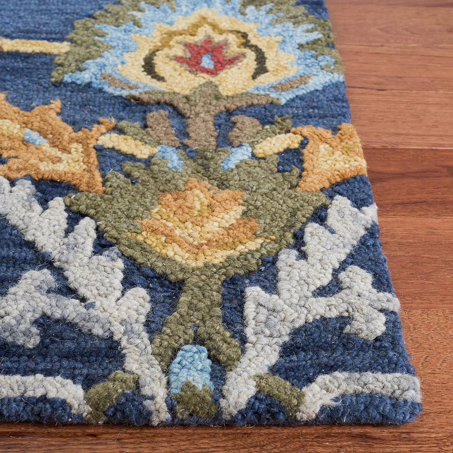 SAFAVIEH Blossom Collection Area Rug - 8' x 10', Navy & Multi, Handmade Wool, Ideal for High Traffic Areas in Living Room, Bedroom (BLM402A)