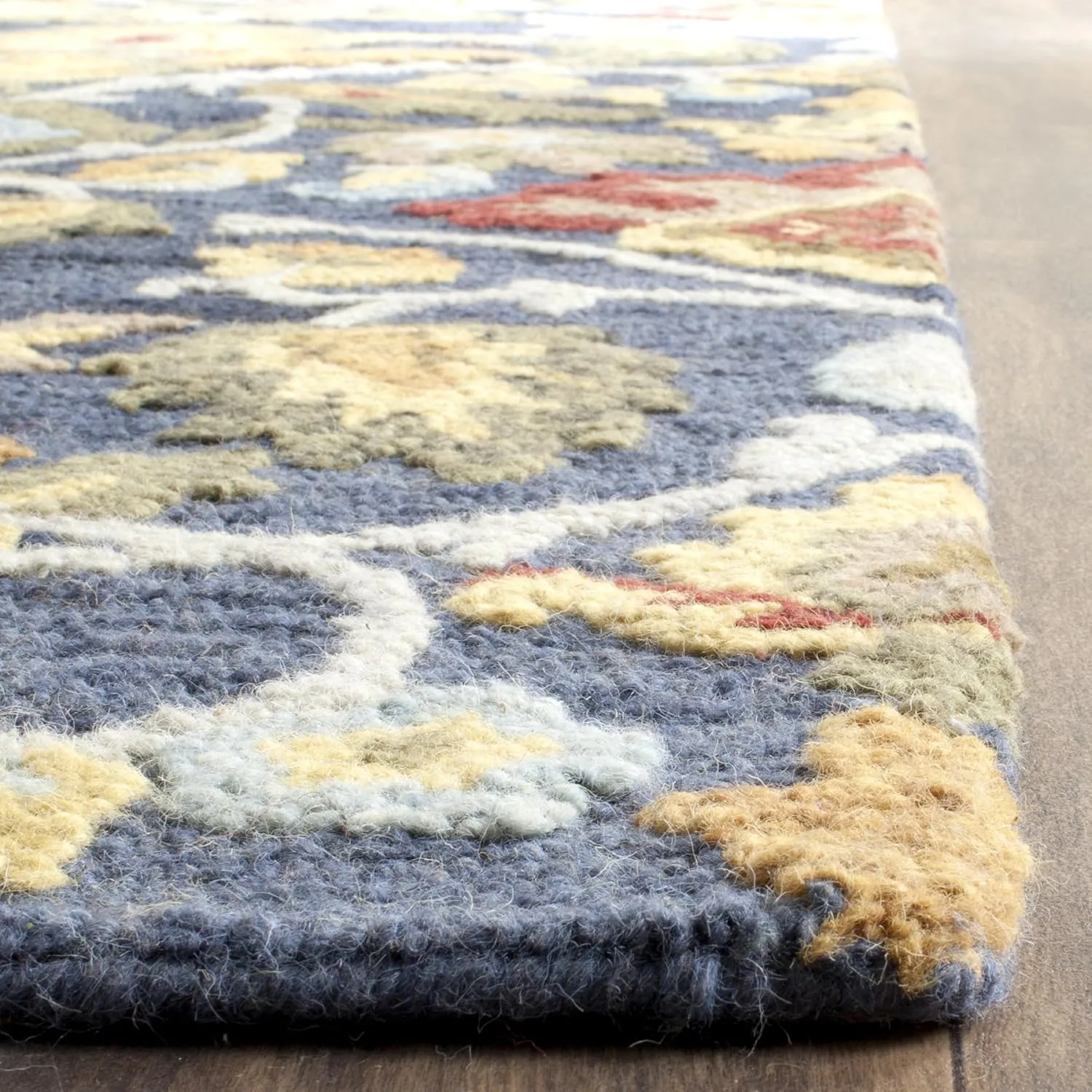 SAFAVIEH Blossom Collection Area Rug - 8' x 10', Navy & Multi, Handmade Wool, Ideal for High Traffic Areas in Living Room, Bedroom (BLM402A)